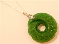New Green Jade Donut Pendant with Carved Dragon.