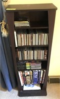 BOOK SHELF WITH CDS AND BOOKS