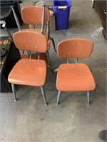 4 orange small children’s school chairs