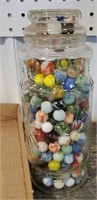 Planters peanut jar full of marbles