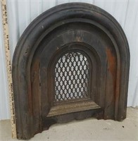 Ornate cast iron fireplace front