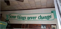 Vintage sign on Masonite 
Approx 12 ft wide