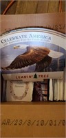 Box of greeting card covers and Leanin' tree rack