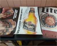 3 plastic beer posters