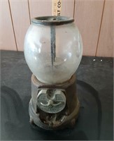 Very old gumball machine cracked glass