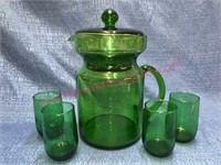 Green glass pitcher w/ lid & 4 juice glasses