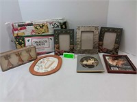 Various picture frames and table cloth