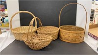 Four decorative wicker baskets