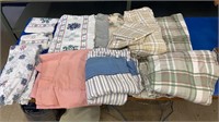 Bedding lot: six non-fitted sheets, three fitted,