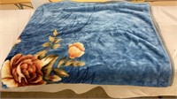 Blue floral fluffy blanket. Approximately double