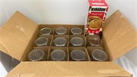 One box of twelve 70mm 500ml canning jars with an
