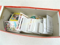 Box of Assorted Sports Cards / Coins / Puzzle