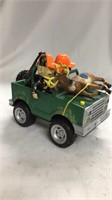 Toy truck moves plays music. Battery operated