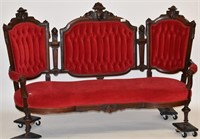 Walnut Victorian carved Jenny Lind sofa