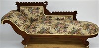 Walnut carved fainting couch