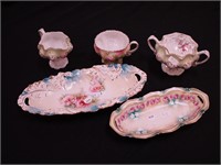 Five pieces of RS Prussia china, four signed