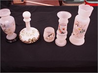 Five pieces of white opaque decorated crystal