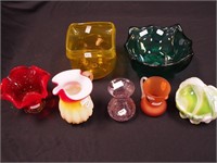 Seven pieces of colored glass including flower
