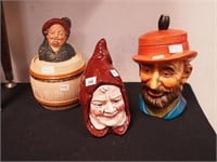 Three figural tobacco jars: two are men's