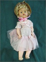 Baby doll with hat and moving eyes