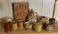 Pottery bowls, mugs, pitcher, carved art
