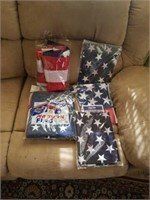 Group of 6 American flags. Different sizes