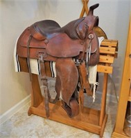 Saddle with stand