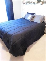 Black and gray comforter set with bed skirt -