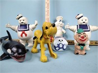 Plastic and rubber toys including Pluto,