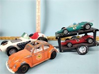 Toy cars including Hubley Beetle and race cars