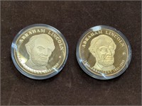 Pair of oversized (2") Abraham Lincoln gold