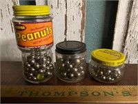 Vintage jars of steel marbles