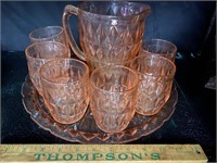 Pink glass pitcher and glasses