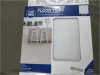 Peel and stick vinyl floor tiles