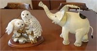 Large figurine of snowy owls and tin elephant