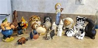 Box of knick knacks and figurines including black