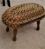 Braided rug covered footstool