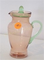 Pink Depression Pitcher with green handle