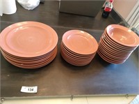Pinkish Colored Plates and Bowls