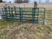 12’ hinged metal gate.