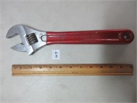 RED HANDLED THUMB ADJUSTABLE WRENCH
