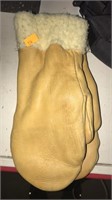 Tan leather mittens. Lined.