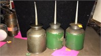 3 oil cans.