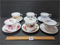 6 PRETTY CUPS AND SAUCERS
