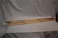 Old wooden shotgun cleaning rods