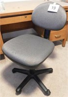 Adjustable office chair on casters
