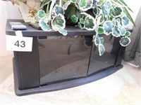 Black large TV stand with black glass doors,