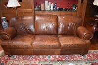 LEATHER SOFA BROWN 92" LONG 37" D X 34" H -