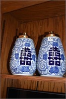 TWO BLUE/WHITE GINGER JARS W/ GOLD LIDS