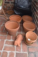 GROUP OF CLAY PLANTERS AND RABBIT